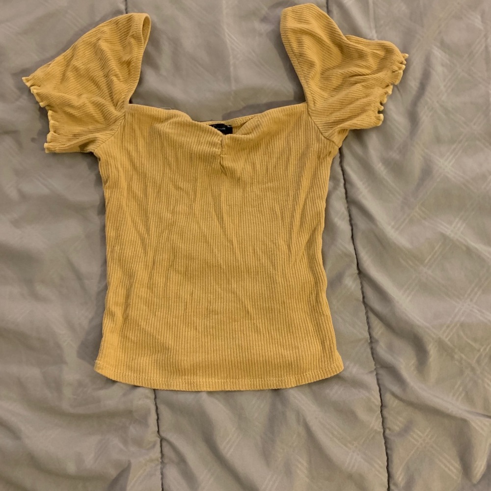 Yellow blouse.